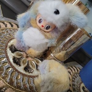 Furry Multicolor Doll with Hat